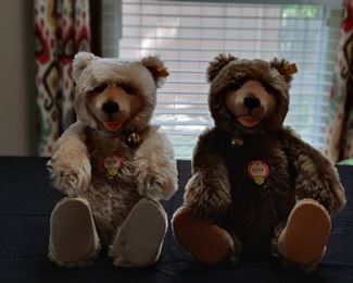 On the left - STEIFF Replica of 1930 Teddy Baby Jointed Blond Bear 0175/35 Blue Collar 13"  - Sold on June 10th on Ebay for $79.99 plus 12.99 Shipping - On the right - RARE - CLASSIC STEIFF Replica of 1930 " Tall Brown Mohair Jointed Teddy Bear w/tags (4.2)
