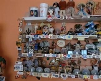 Collection of snow globes and miniatures