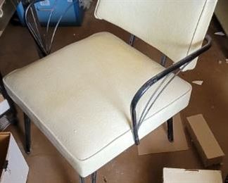 Comfortable white padded chair
