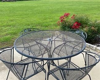 Wrought iron patio table / chairs