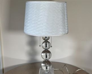 MODERN GLASS BALL TABLE LAMP | Glass balls stacked on an acrylic square base, two bulbs with pull tabs on chrome hardware; h. 24-1/2 in. to top of shade; tested and turns on; scratches to bottom of base 