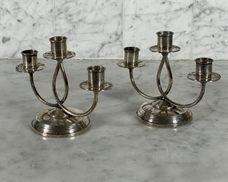 PAIR STERLING CANDLE HOLDERS | Fisher sterling silver, three tiered candlestick holders with weighted bases; h. 5-1/2 in.