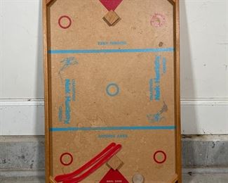 NOK HOCKEY FLOOR GAME | Champion Nok Hockey by Carrom with original wood puck and both sticks included; 24 x 35-1/2 in. 