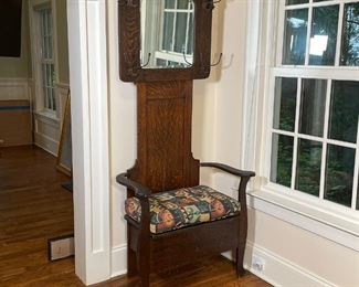 OAK HALL TREE | with storage in bench, seat cushion, beveled mirror and four pairs of coat hooks; 73-1/2 x 32 x 17 in. 