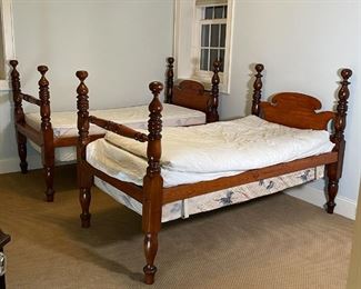 PAIR CANNONBALL BEDS | Two twin beds with four turned wood posters; 82-1/2 x 51 x 43 in. 