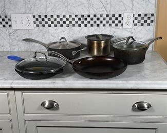 (5pc) POTS AND PANS | Including Lodge 10-1/2 in. cast iron skillet, 12 in. Earthpan, two Caphalon lidded pots (larger dia. 9-1/2 in.), one Centurion by Lincoln pot No. 3702 (dia. 6-1/2 in.) 