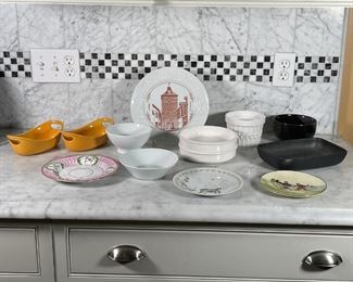 (13pc) ASSORTED DISHWARE | Including Lembeye Yves Ducourtioux souvenir plate (10 in.), Baden painted bread plate, glazed rectangular dish (9 x 6 in.), pair of yellow Rachel Ray 12 oz. oven safe dishes, pair of white Nikko Japan shallow bowls, Dolomite popcorn bowl, and French porcelain "Café au lait" drinking bowl 