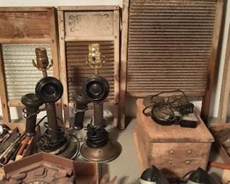 Washboards, cuckoo clock, vintage candlestick and rotary telephones.