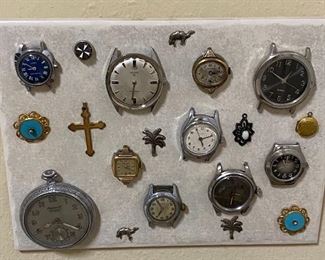 Assorted Wrist Watch Faces Mounted on Ceramic Tile