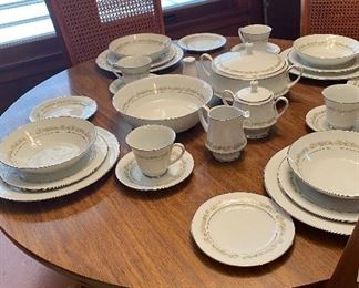 Noritake China Daisy Pattern, Dining Room Table with Cane Back Chairs