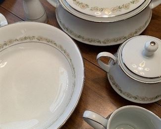 Noritake China Daisy Pattern, Dining Room Table with Cane Back Chairs