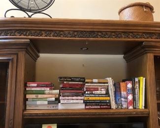 Books, wire accent and basket. Entertainment center not for sale.