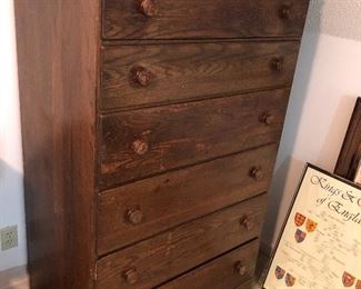 Nice, wood chest of drawers. Tall and deep.