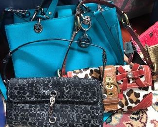 Michael Kors and Coach handbags, new with tags.
