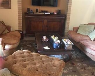 Charleston Ottoman.   Rug available.  Sofa with 5 throw pillows and Love Seat with 3 Throw Pillows.  Solid teak coffee table.   