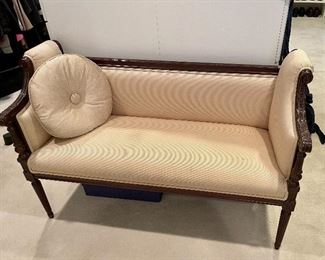 Carved wood armsettee 