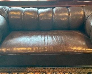 Leather channel back sofa