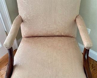 Upholstered chair with wood arms