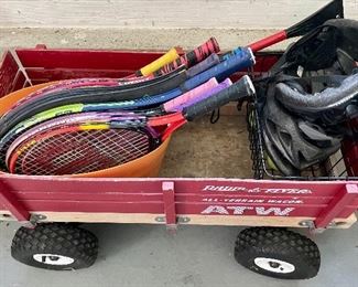 Red wagon & tennis rackets 