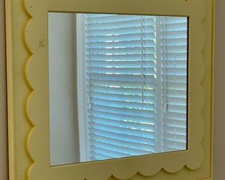 Yellow framed mirror 