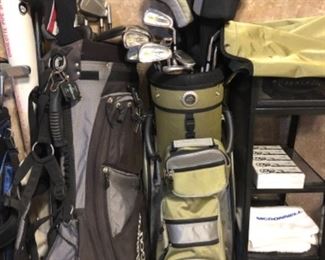 His and hers golf sets with bag.