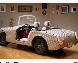 The "Woven Car" 60's model MG Midget turned into a piece of art. This car is available at the sale.  It is available at the sale in complete condition as shown, with original tires.  Look up Corian.com and Woven Car