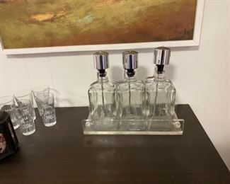Nice vintage liqueur dispensers in acrylic holder