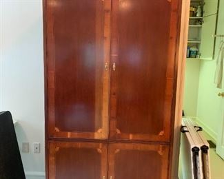 #40	Hekman Entr. Cabinet Wood w/inlay 4 doors 2 drawers, record storage w/pull-out tray,  Max TV Size is 40" (on swivel base)	 $75.00 
