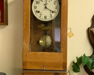 #42	 Simplex Wood time  Clock -  13x8x31	 $200.00 
