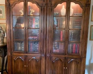 #70	101 leather bound books 10 ea	 $1,010.00 
#71	(2)wood book case with  2 glass door 2 wood doors 4 shelves with light inside 36x14x81 2@200 ea	 $400.00 
