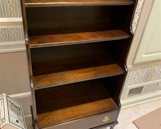 #86	wood 4 shelf Bookcase w/inlaid Top & 1 drawer  22.5x13x48 - on wheels	 $150.00 

