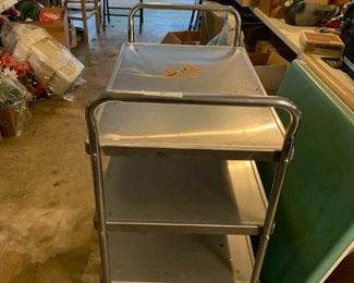 #208	Stainless Steel Cart w/3 shelves on Wheels   37x21x36	 $50.00 
