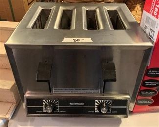 #215	Commercial Grade 4 Slice Toastmaster Toaster	 $30.00 
