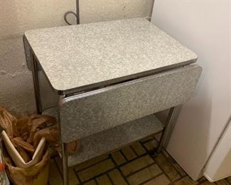 #224	Laminate Double drop-side Stainless Rolling Cart 24x17-33x29	 $30.00 
