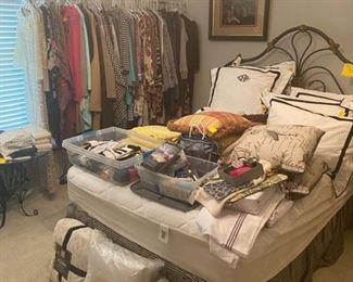 Lots of NEW WITH TAGS (NWT) items. More clothes - sizes XS - M. Queen iron Bed and frame (mattress & box springs included)