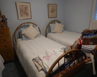 Metal twin beds on casters.  Great beds!