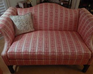 One of the camelback chippendale Ethan Allen loveseats