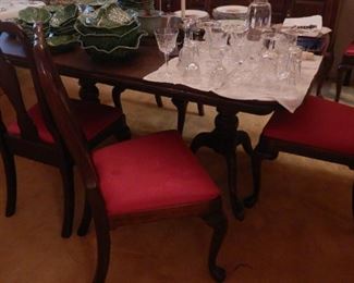 Dining table and chairs by Ethan Allen.  Table has two leaves and has all the custom table pads.  102' long with all leaves in