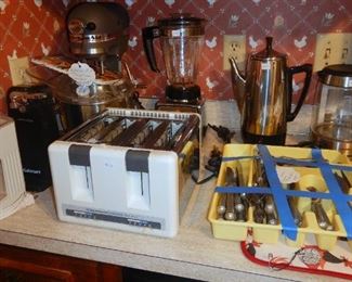 Kitchen ware and a Kitchen Aid pro mixer