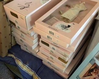 doll clothes in boxes