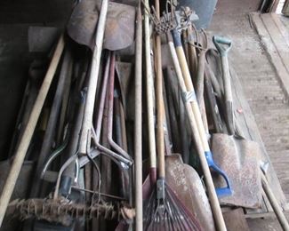 Pallet of shovels, rakes, edgers, hoes, concrete tools
