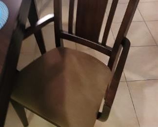 dark wood 6 person dining set chair detail