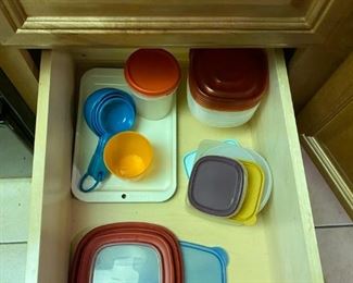 Measuring cups , plastic containers and lids