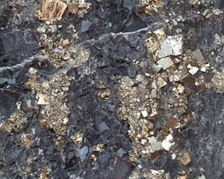 Cubic Pyrite crystals might be found,