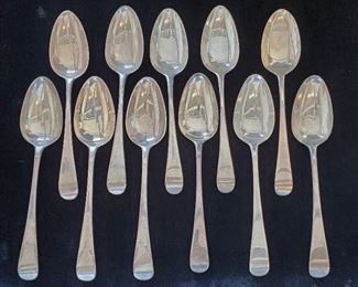 JUST ONE OF SEVERAL LOTS OF EARLY GEORGIAN SILVER Eleven antique 9" sterling silver serving spoons with British hallmarks: Lion Passant (sterling silver), crowned leopard (London) city mark, King George III (1786-1821) duty mark, 1791 date mark, and RC (Richard Crossley) makers mark. 