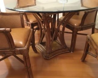 Close  up of pedestal and chairs to breakfast set