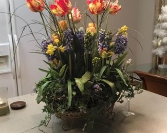 Beautiful flower arrangement in basket on kitchen island is $75.00
