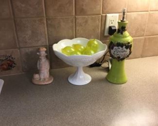 Kitchen decor - piece on left is $8.00; milk glass compote with decor is $18.00; and green bottle on right is $15.00