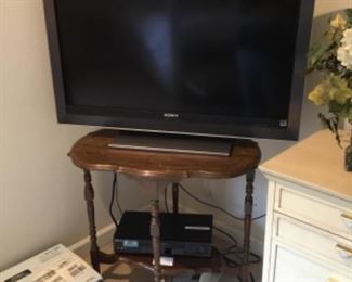 Master Bedroom - television $250.00 - antique 4 legged table is $200.00