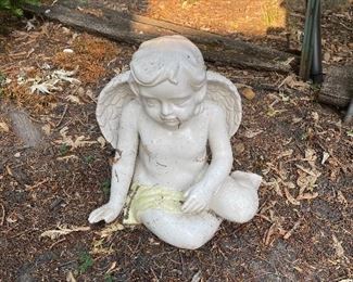Cherub yard art, resin